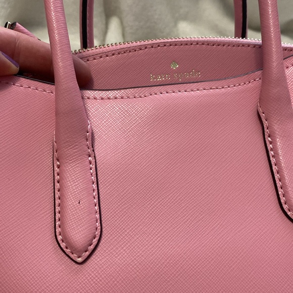 Kate Spade Light Pink Purse can be used as a crossbody or carried by the handles - Picture 9 of 10